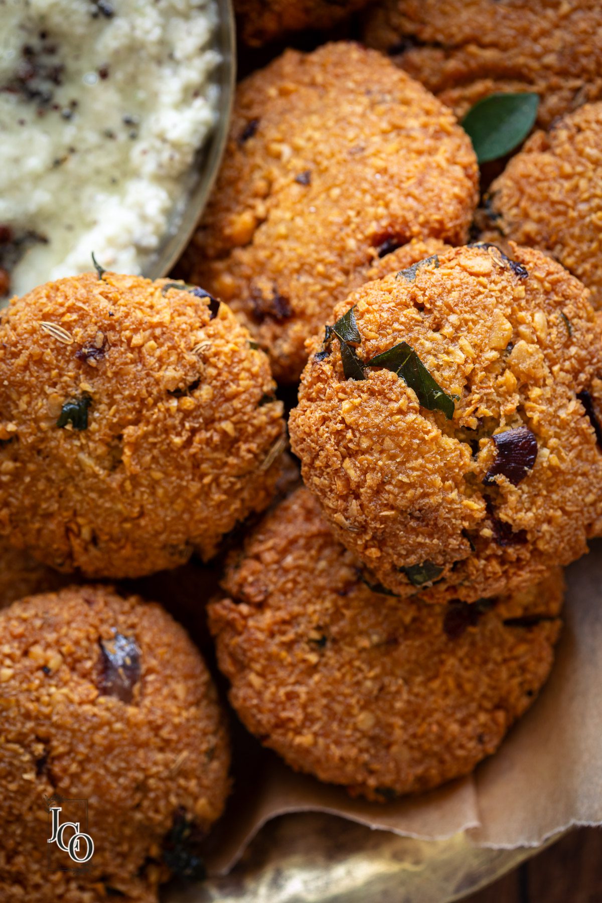 Close up image of crispy chana dal vada.