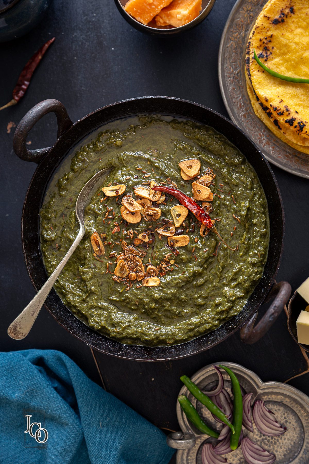 North indian winter staple sarso ka saag and makki ki roti served with jaggery, salad and butter on the side.