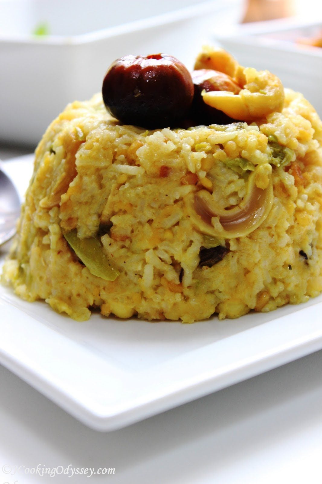 Khichdi pulao placed in a white plate