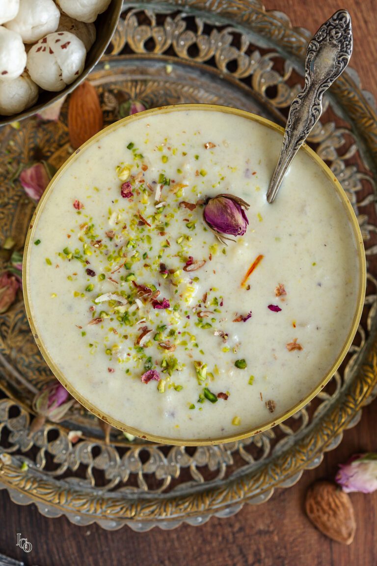 Makhana kheer garnished with chopped pistachio nuts and almonds.