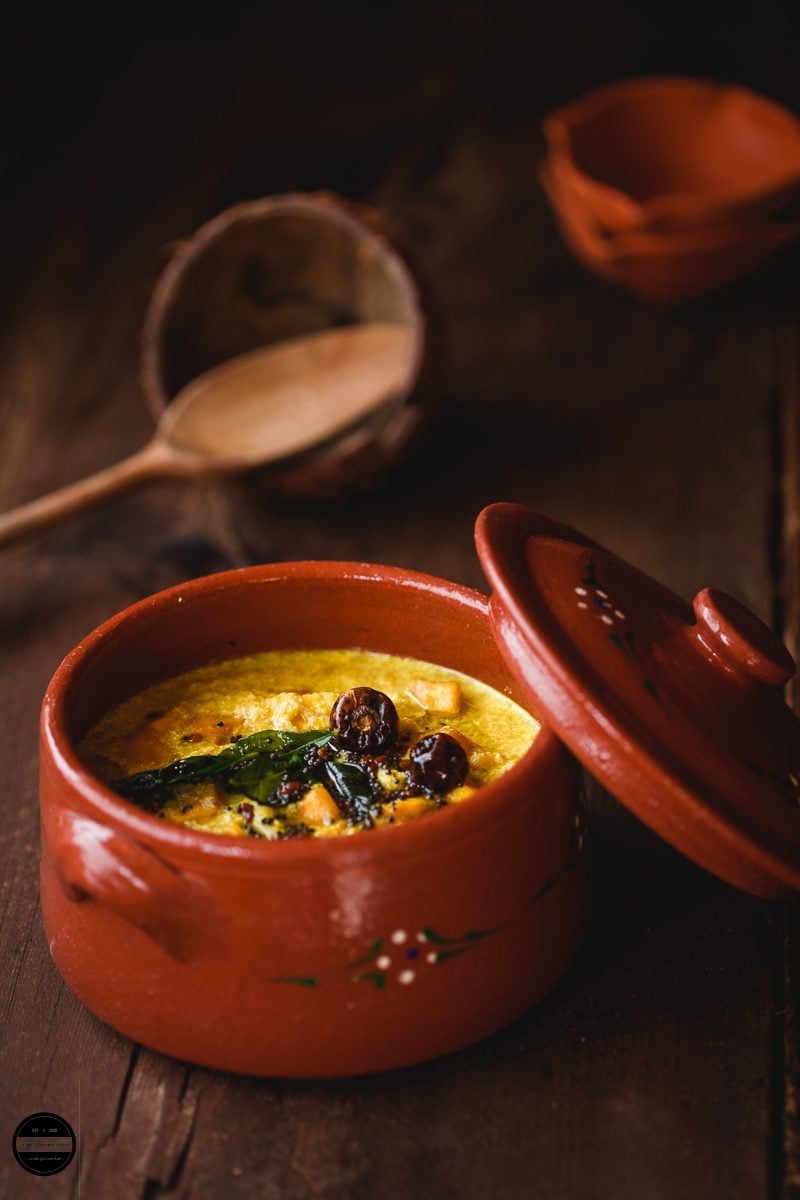 Mambazha Pulissery kerala style served in a clay bowl