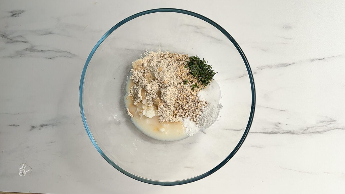 vegan oatcakes ingredients in a mixing bowl