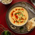 Sultani dal served in a bowl garnished with chopped coriander leaves and slit green chilli.