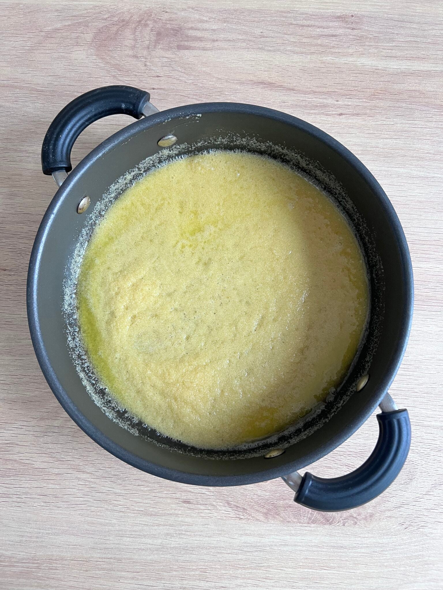 step by step sooji no siro recipe - cooked semolina in a pan