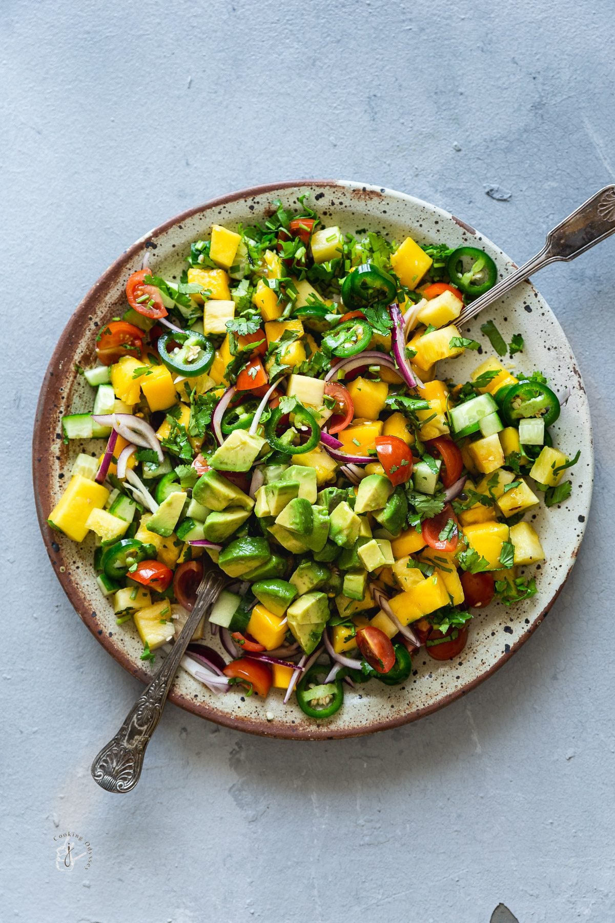 mixing salsa in a plate.