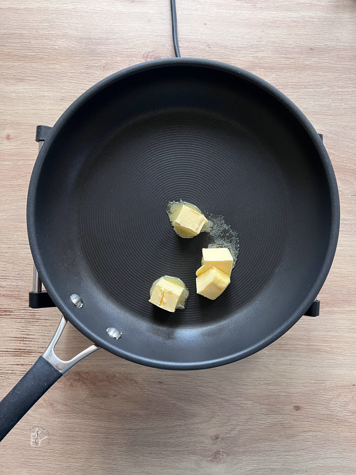 butter melting in a pan