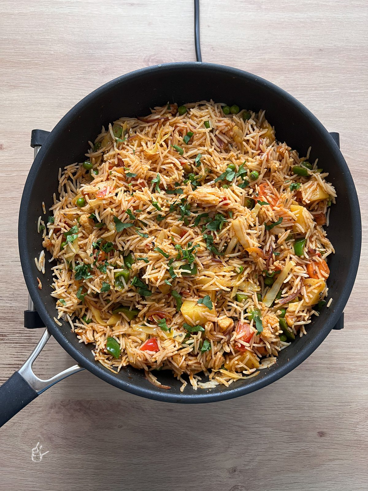 kasoori methi and coriander added to the tawa pulao 