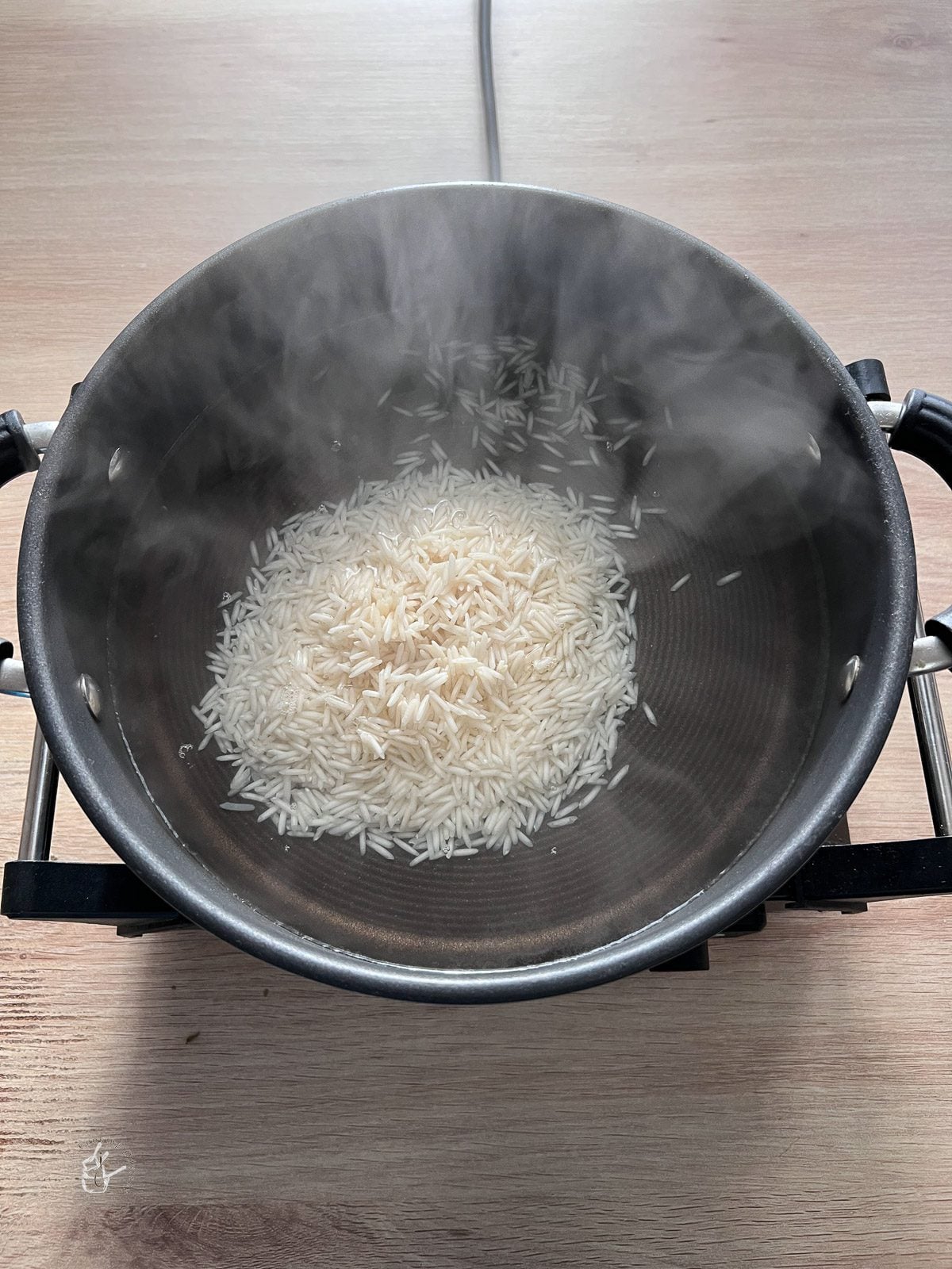 rice cooking in a pan