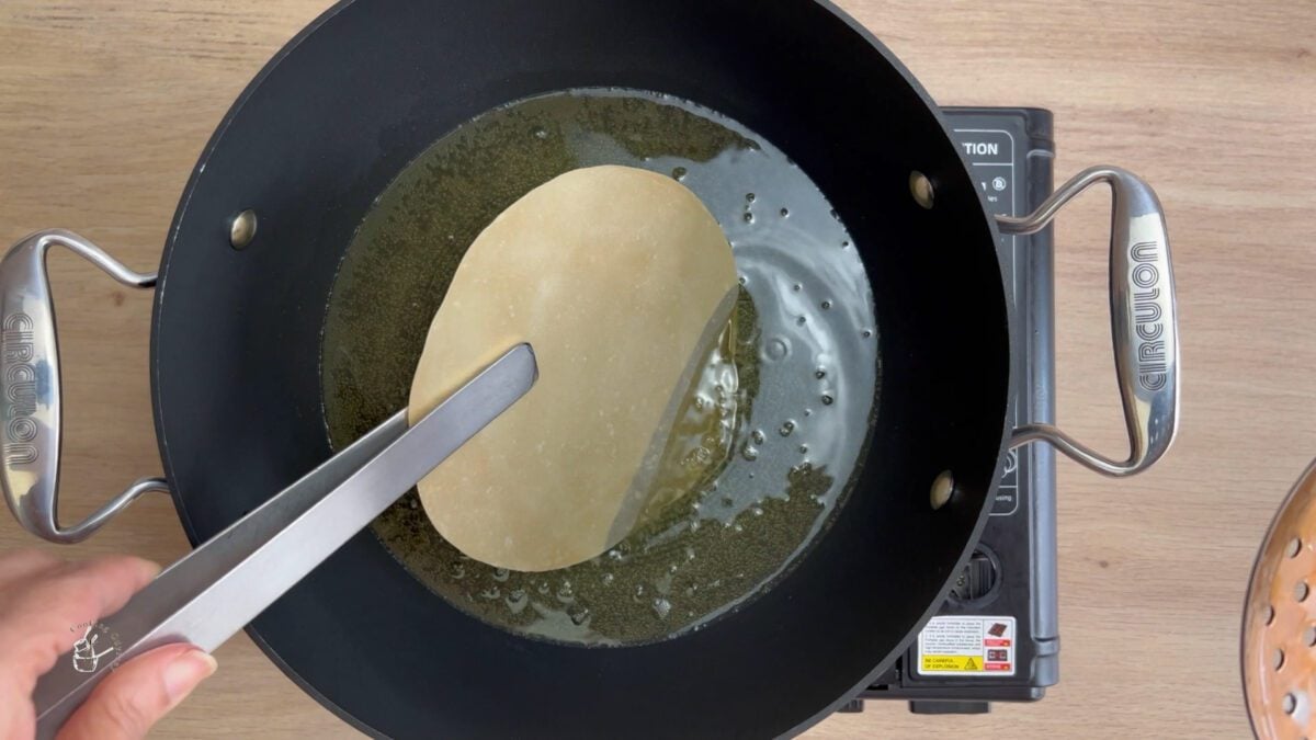 poppadom in hot oil