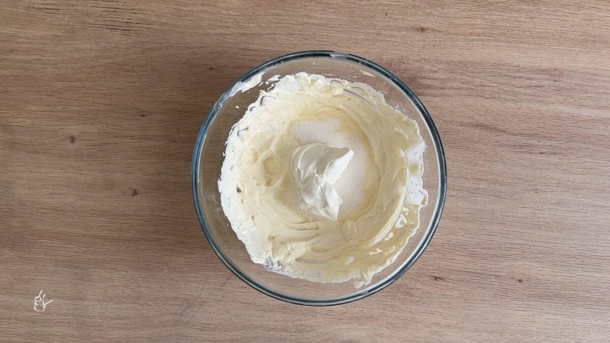 sugar and yogurt added to the whipped cream cheese