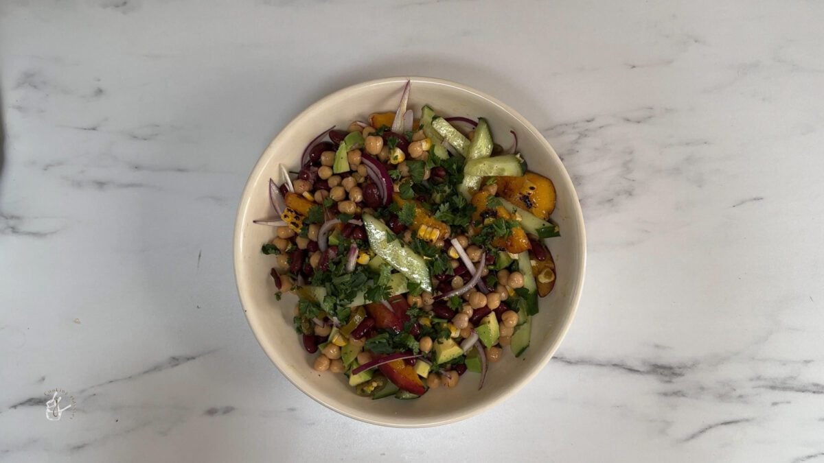 Grilled Nectarine, Corn and Bean Salad in a round bowl