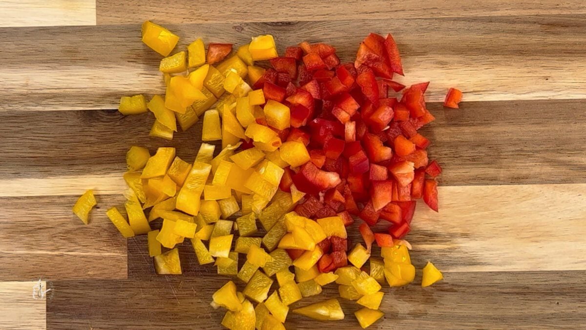 chopped peppers on a chopping board