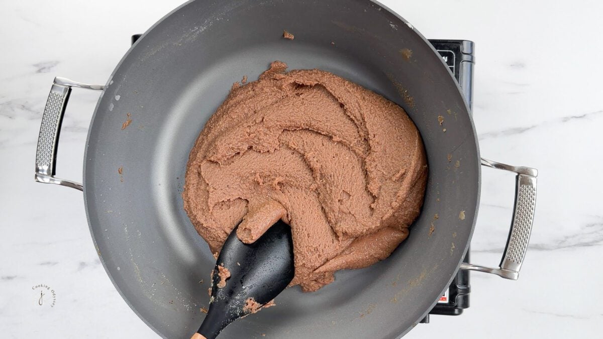 caramel barfi mixture prepared in a pan