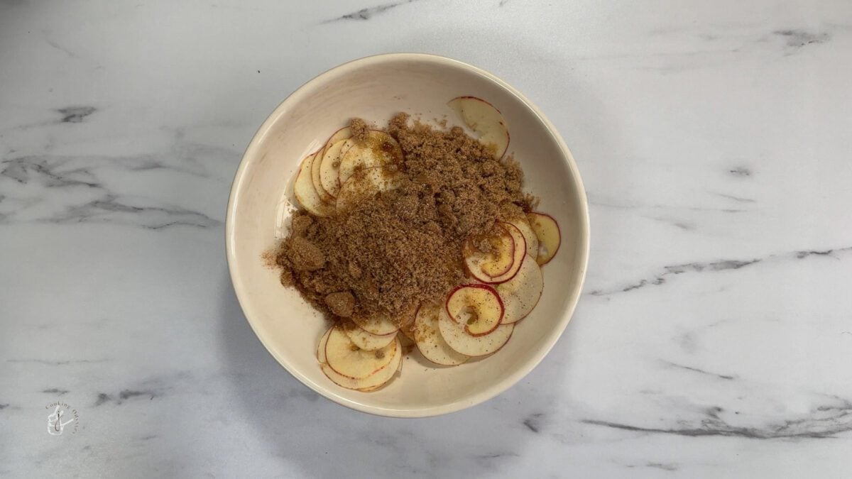 Brown sugar and spices added to the sliced apples