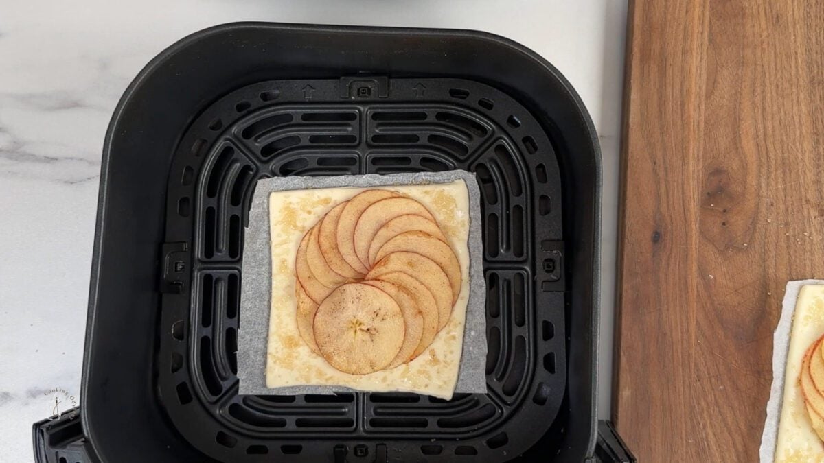 raw puff pastry tart square in the air fryer basket