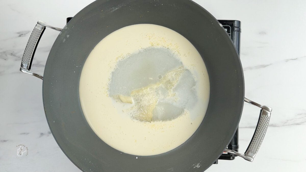 milk, cream and sugar in the pan