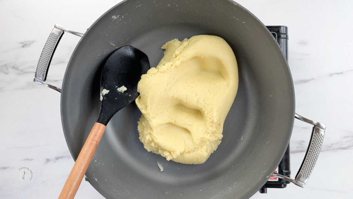 vanilla barfi mixture in a pan 