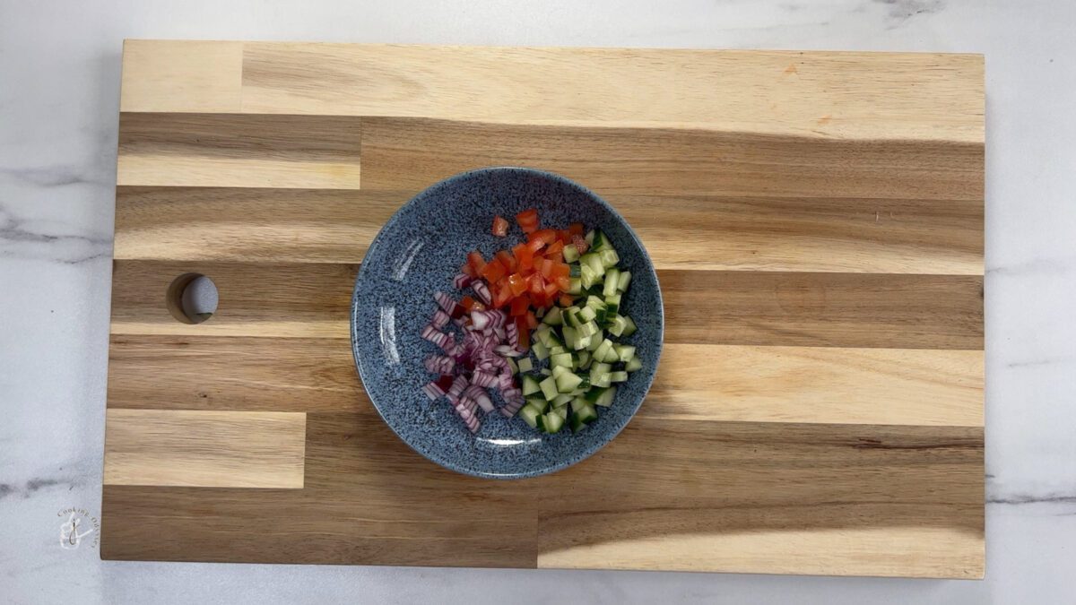 chopped vegetables in a blue bowl