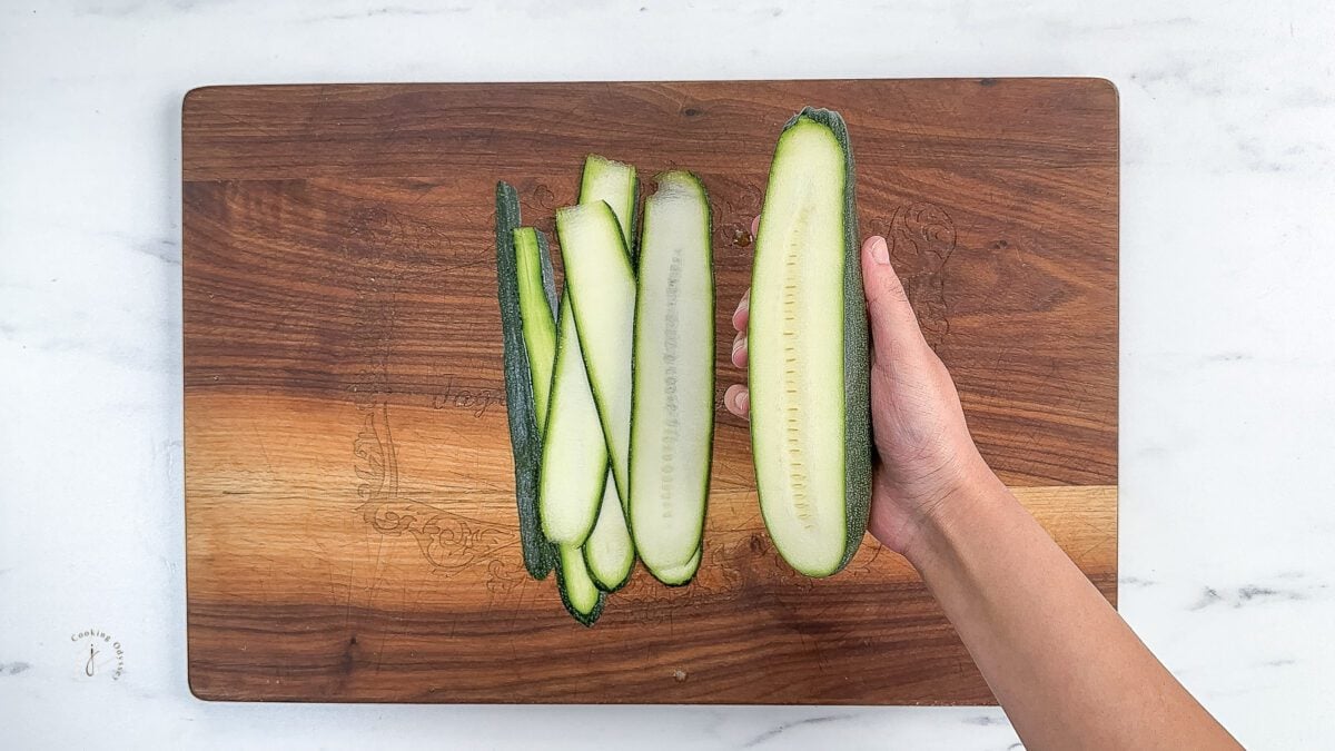thin ribbon of zucchini on a chopping board 