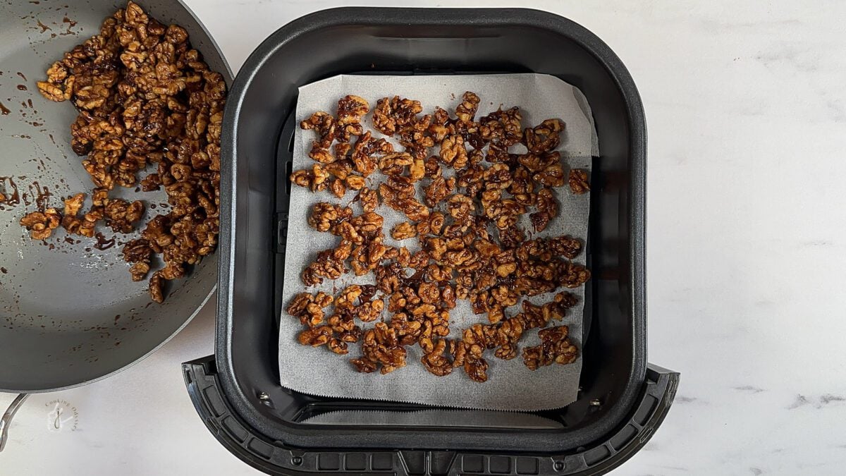 best candied walnuts in the air fryer basket before roasting 