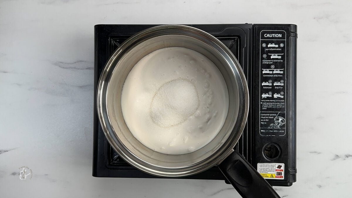 coconut milk and sugar mixed in the pan to make coconut syrup for coffee or latte