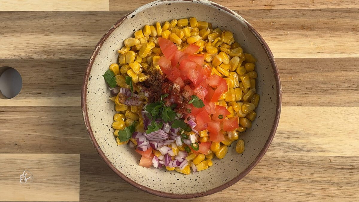 crispy corn chaat served in a bowl