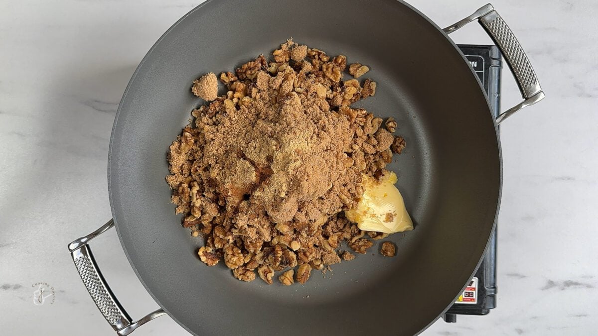 candied walnuts ingredients placed in the frying pan