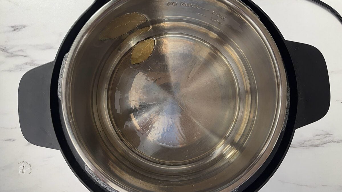 bay leaf added to the hot oil in the instant pot pan