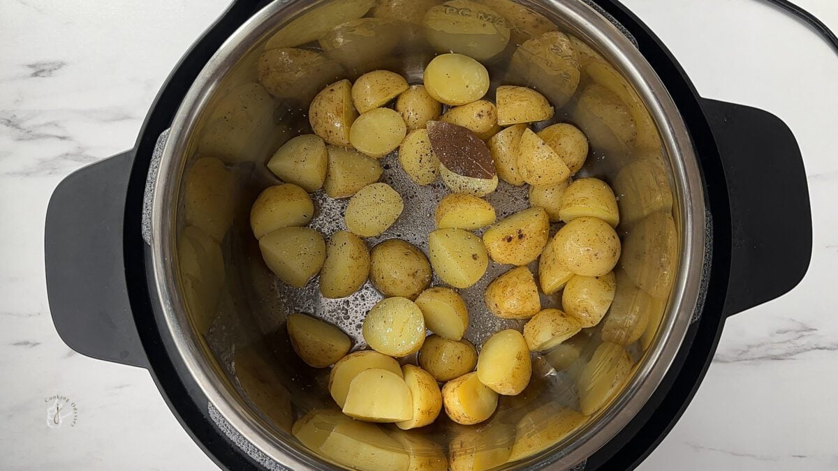 steamed potatoes added to the hot oil in the instant pot