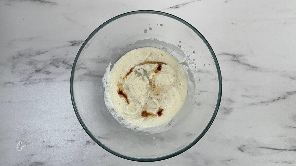 wet mixture of rasmalai cake in the bowl
