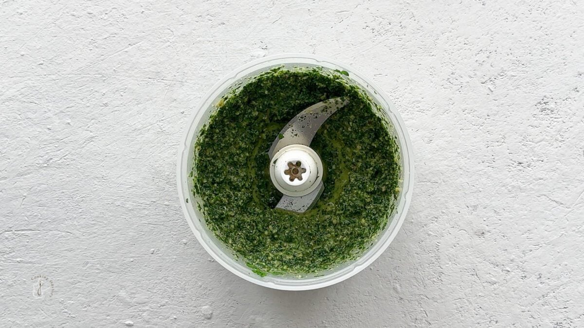 blended walnut parsley pesto in the blender jar