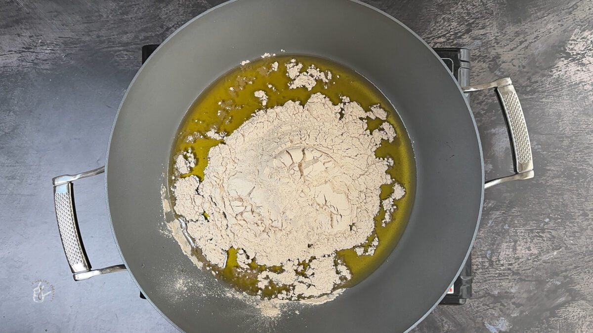 melted ghee and water chestnut flour in the frying pan