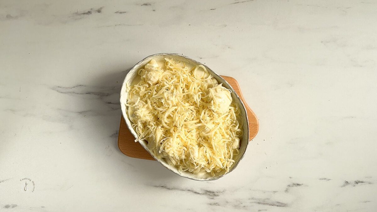 grated cheese sprinkled on cauliflower florets 