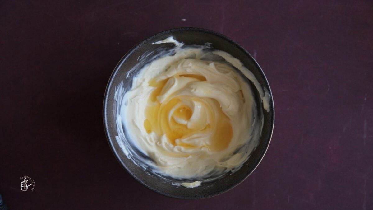 gulab jamun sugar syrup added to the whipped cream and cheese