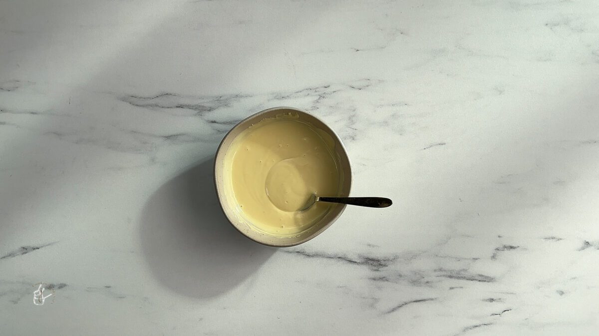 melted white chocolate in a white bowl