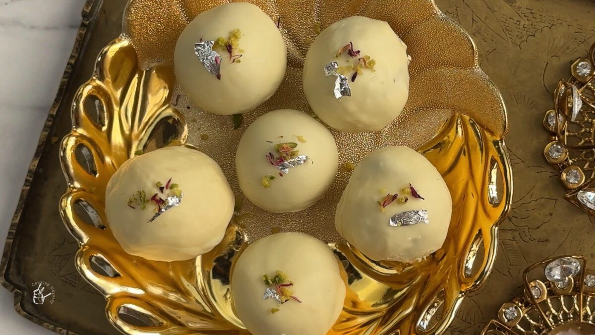 gulab jamun truffles garnished with pistachio dust and rose petals
