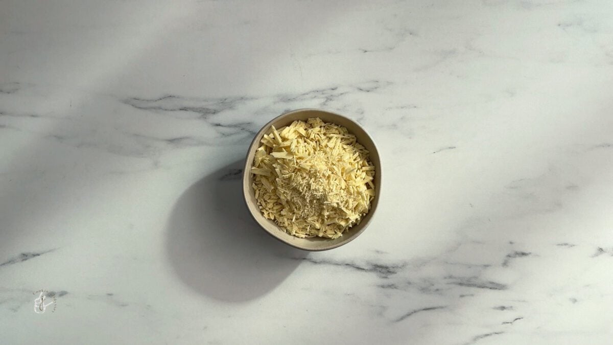 finely chopped white chocolate in a white bowl