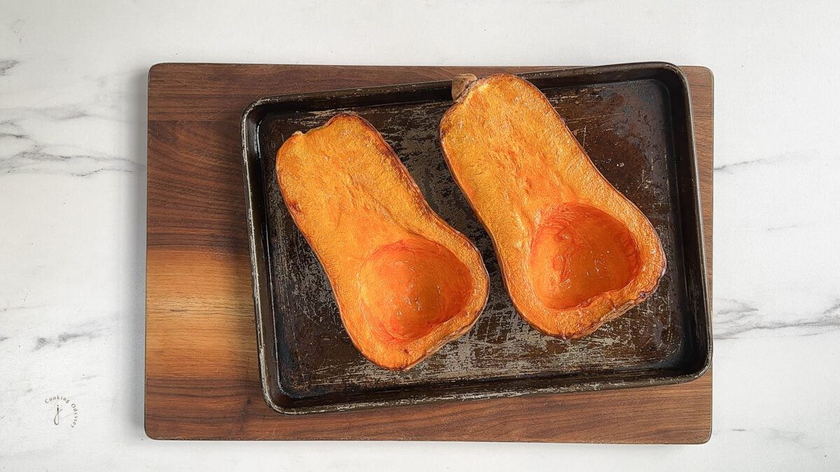 oven baked two halves of butternut squash on the baking tray