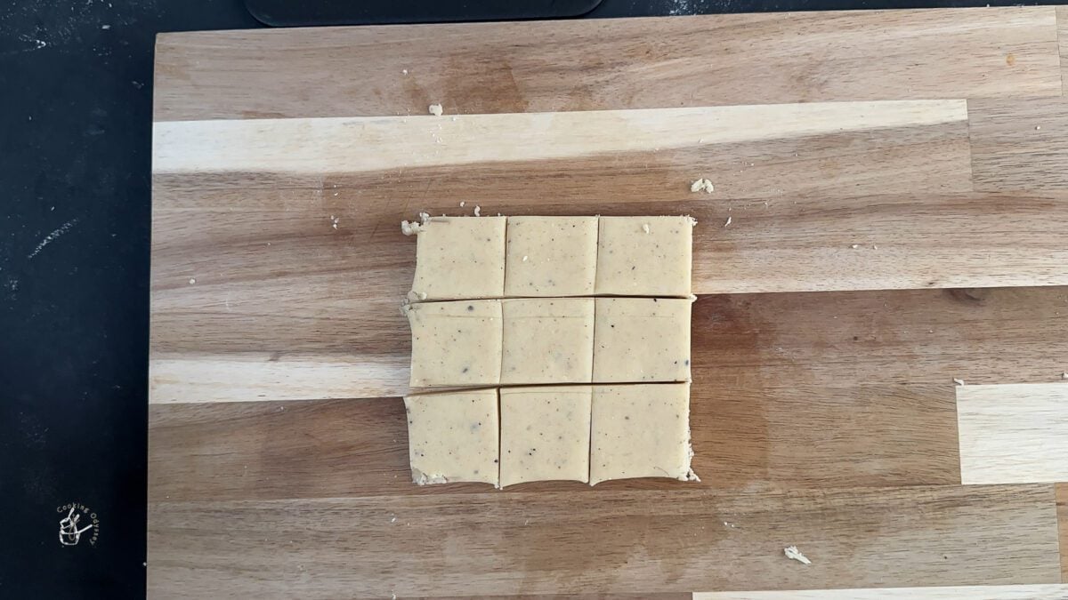cut eggless indian cookies on the board