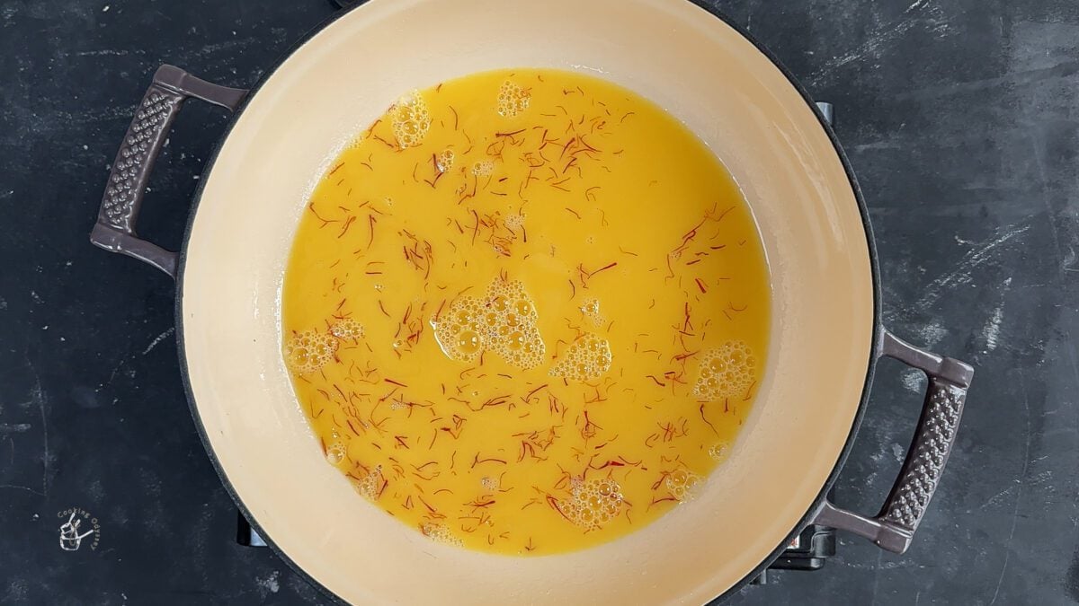 in the pan saffron infused almond milk added to the boiling sugar syrup