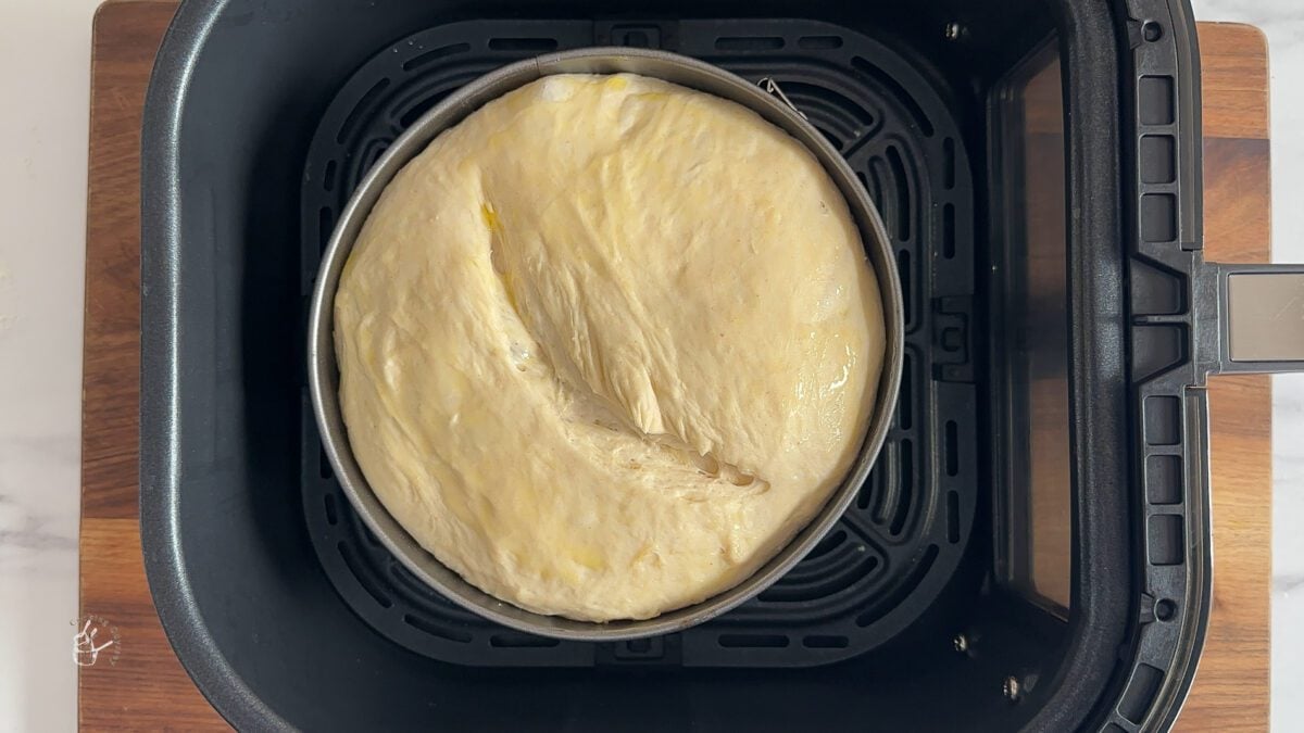 bread pan placed in the air fryer basket.