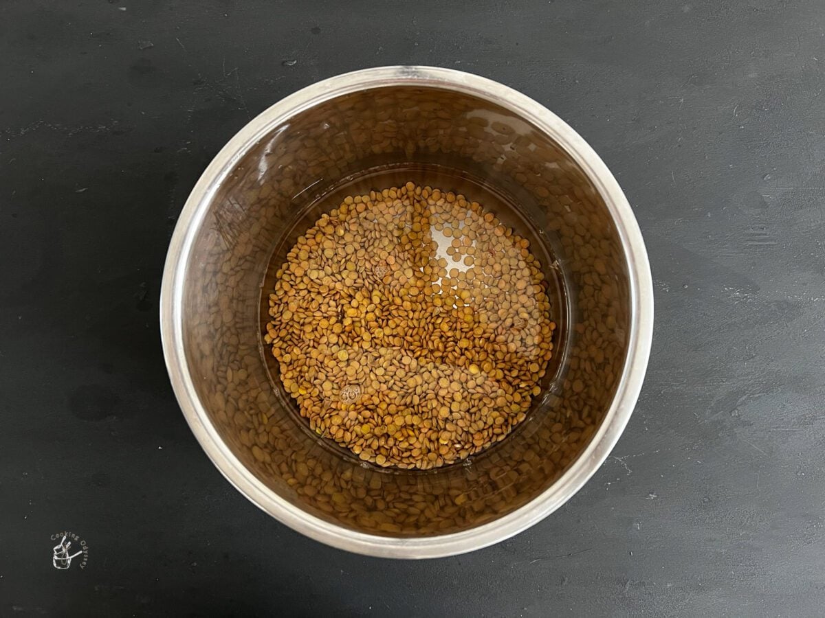 washed graw green lentils in a instant pot with added water.