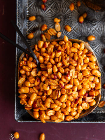 a bowl of masala peanuts in a serving tray.