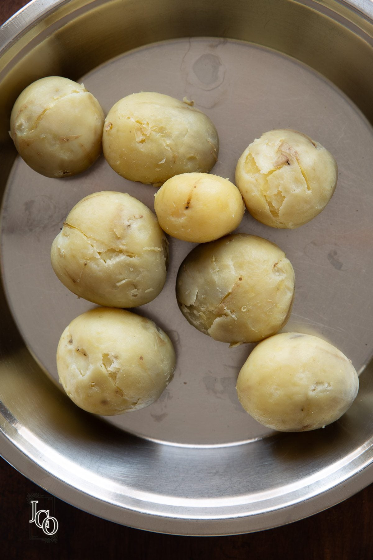 Skin peeled of Boiled potatoes.