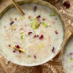 Seviyan kheer garnished with chopped nuts and dried rose petals.