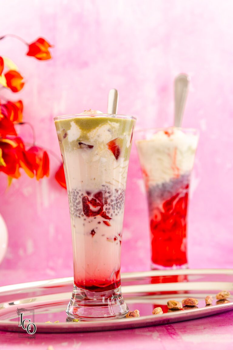 Falooda served in glasses with a spoon.