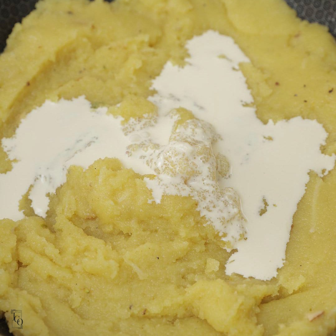 Cream added to halwa.