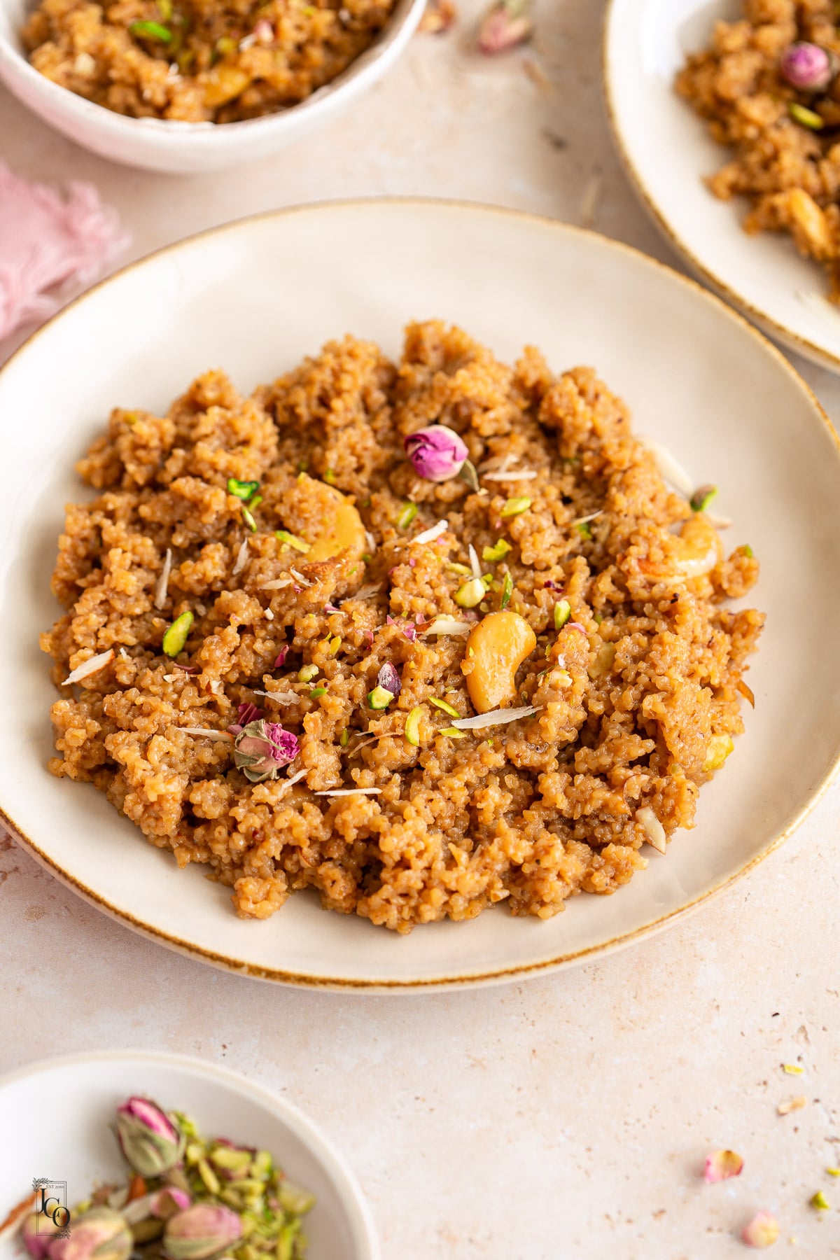 Caramel lapsi served in three beige bowls.