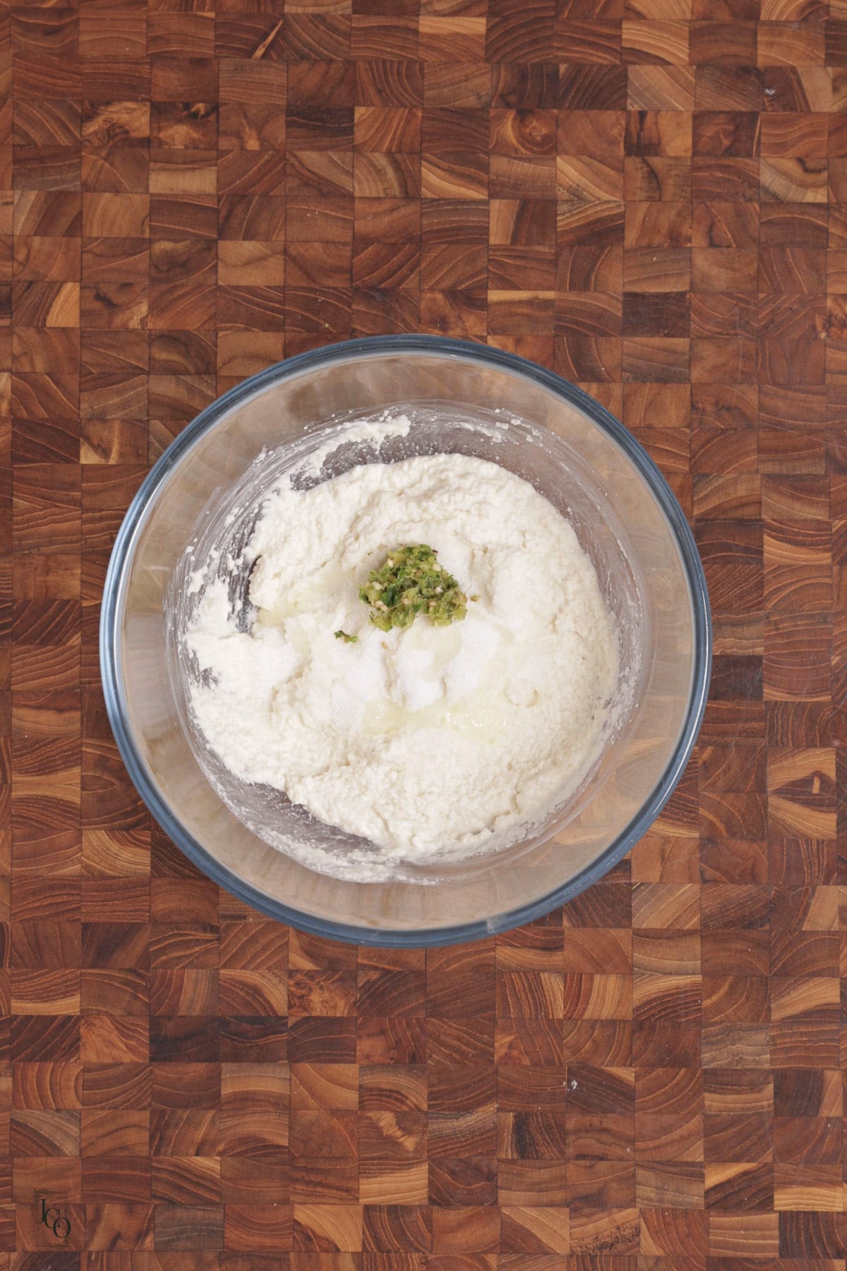 Chilli ginger, salt, sugar and oil added to semolina batter.