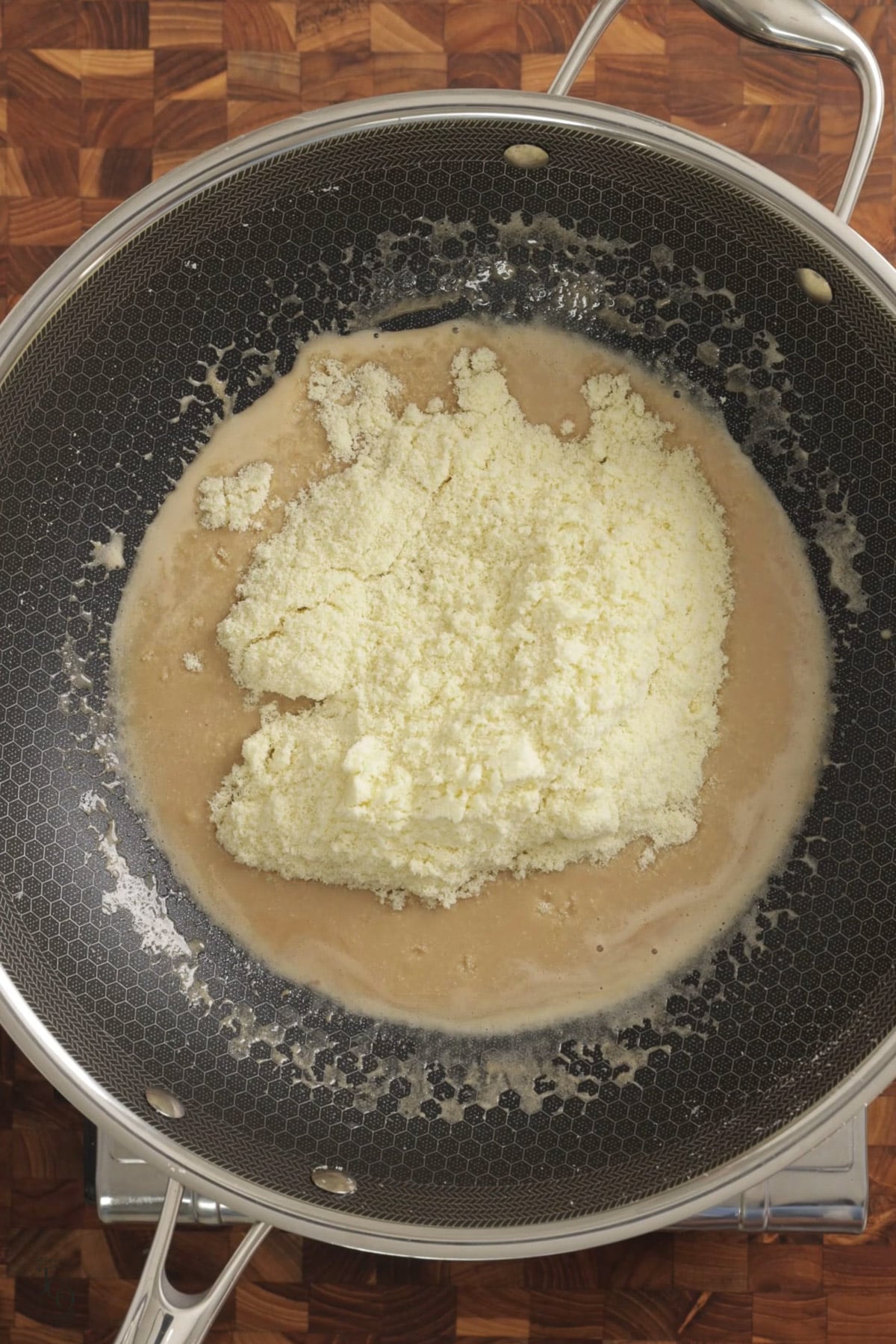 Roasted milk powder added to brown milk syrup. 